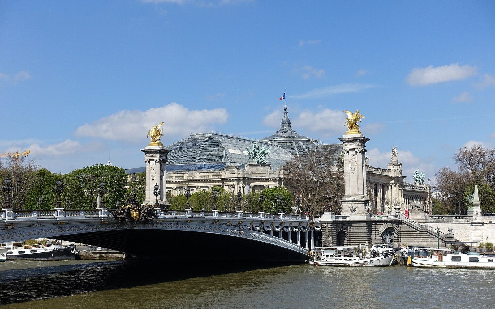 The Grand Palais and the Pont Alexandre III from the Seine.